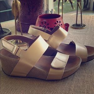 Clark’s Gold cork wedges.